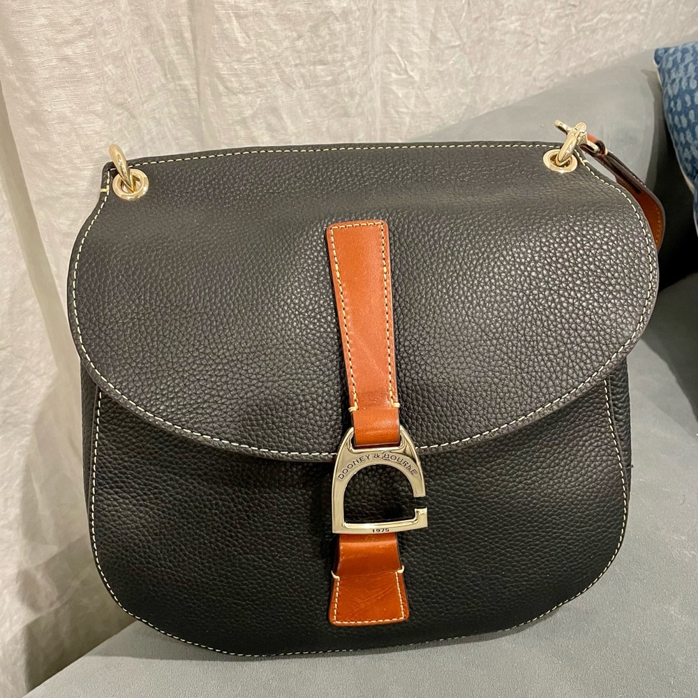 This is a brand new bag with the cover bag and bag details included.